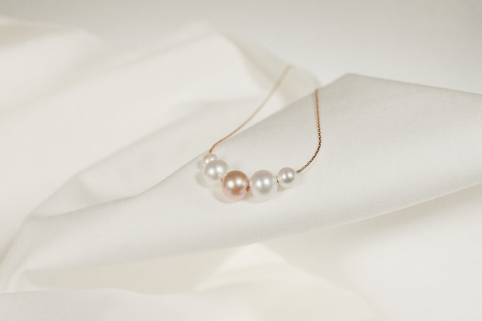 Graduated Floating 5 Pearl Necklace