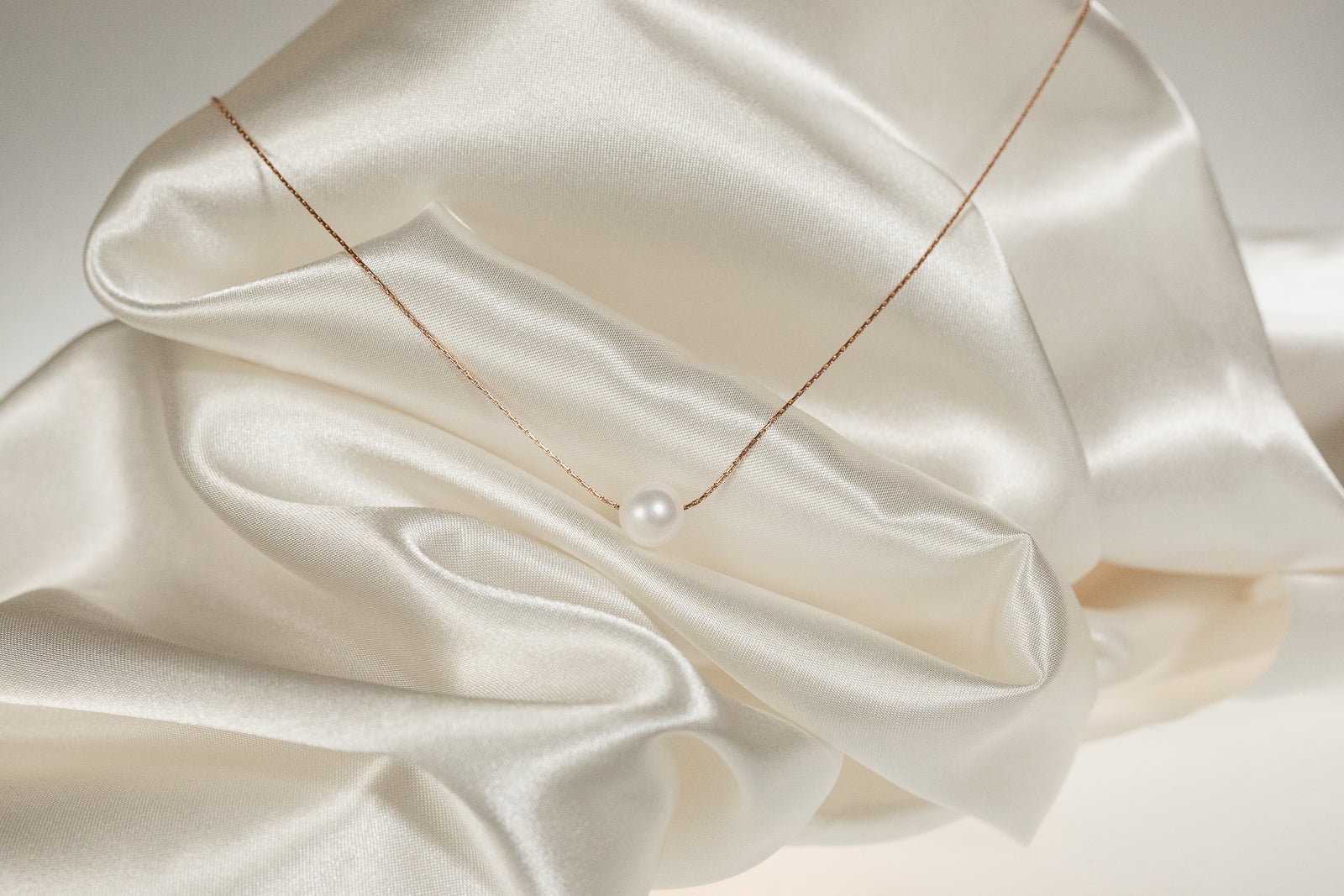 Floating Pearl Necklace on Gold
